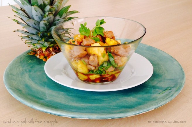 sweet spicy pork with fresh pineapple with text